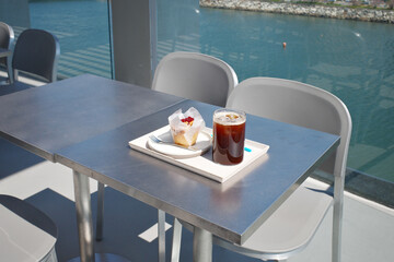 river balcony coffee bread drink food glass