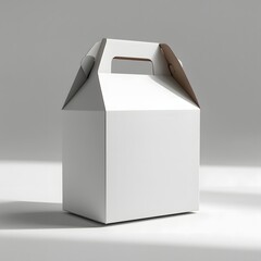 Photorealistic white cardboard gable box with die-cut handle, matte surface, and soft shadows. Front view isolated on white, ideal for branding mockups.