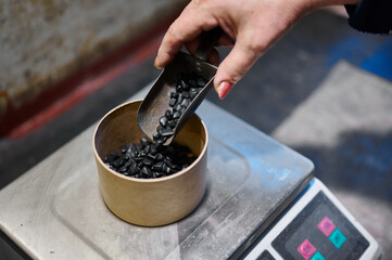 Crafting stunning fireworks in a vibrant factory, where expert hands prepare intricate designs of vibrant colors and effects