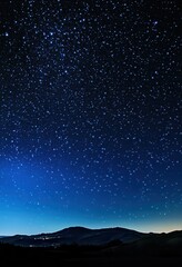 Stunning Night Sky Full of Stars Illuminating the Dark Landscape with Gentle Horizon Line and a Clear Celestial Display of Twinkling Lights