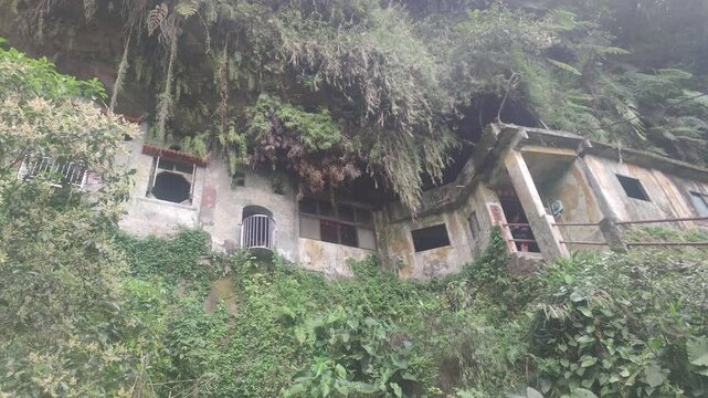 Yinhe Cave Hiking Trail, The waterfall that falls straight down from the cliff on the mountainside is very popular among travelers for its ethereal and beautiful scenery, New Taipei City, Taiwan