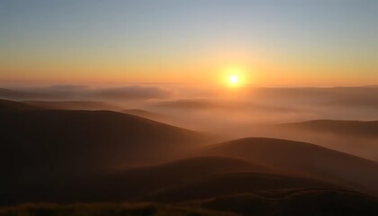 Golden Sunrise Over Fog-Laden Rolling Hills: A Tranquil Landscape View