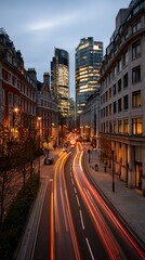 Urban city street at twilight with motion blur of car lights