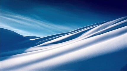 Serene Snowy Landscape with Gentle Curves Under a Clear Blue Sky at Dusk
