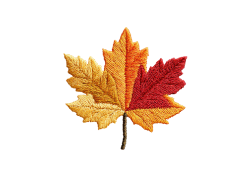 Embroidered maple leaf in autumn colors on a transparent background. Concept of fall, nature, and crafts.