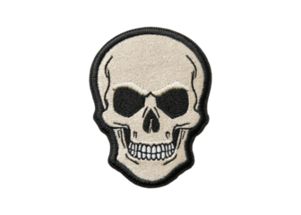 Embroidered skull patch on transparent background. Symbol of danger, death, and rebellion.