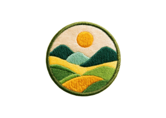Embroidered patch of a landscape with hills and sun. Concept of nature, outdoors, and handmade crafts.