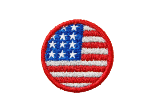 Embroidered patch of the American flag with 13 stars and stripes, isolated on black. Symbol of patriotism and American history.