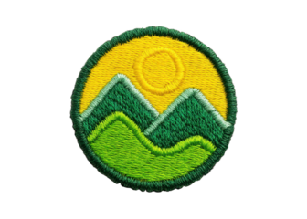 Embroidered patch featuring a mountain landscape with a rising sun. Symbol of nature, adventure, and outdoor activities.