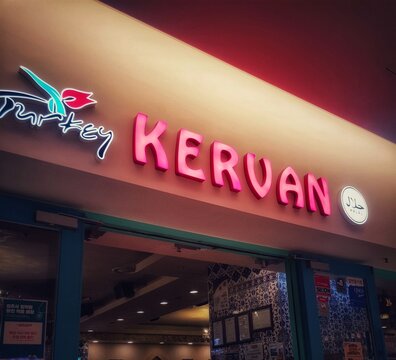 Seoul, South Korea on 7 Nov 2024. Turkey Kervan Halal Restaurant Neon Sign at Entrance for Travel