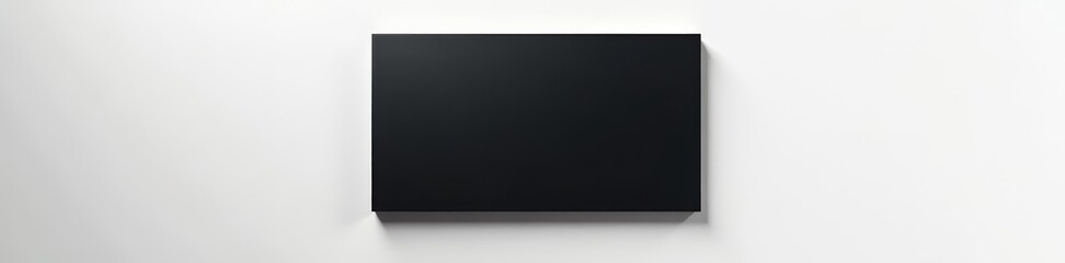 Obraz premium Minimalistic black sign hung on pristine white wall, clean modern design, template, copyspace