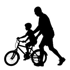 Fototapeta premium Father Teaches Son To Ride Bike Silhouette Family Bonding Moment Togetherness