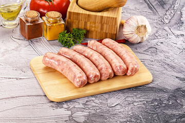 Raw meat sausages for grill