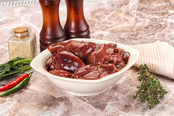 Raw uncokked chicken liver in the bowl
