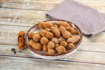 Tropical exotic Tamarind fruit heap