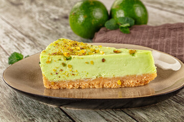 Green pistachio cheesecake served mint