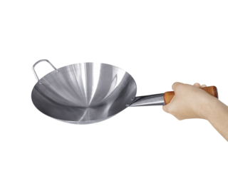 Side view of cast iron skillet in hand PNG transparent.