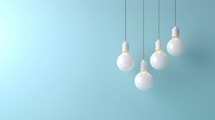 White Lightbulbs Hanging Against a Light Blue Background