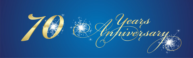 70 Years Anniversary celebration beautiful golden white light elegant brush script calligraphy typography with sparkle firework on blue background banner
