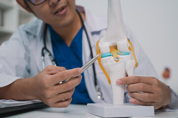 At the hospital, the doctor devised a treatment plan for the patient suffering from joint pain, coordinating with the clinic to ensure comprehensive health care for their disease.