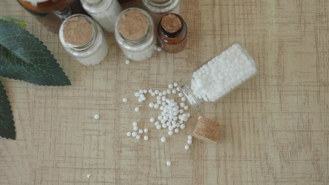 Homeopathy alternative medicine in a glass container 