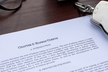 Habeas Corpus Chapter Paper Resting on Wooden Desk
