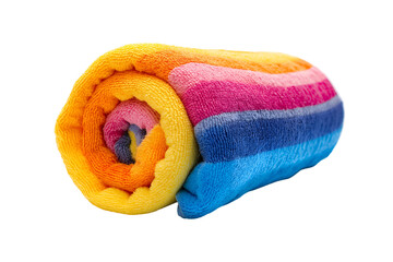 A colorful beach towel rolled up isolated on a white background
