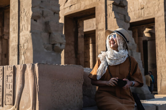 Women exploring the temple of Kom Ombo close to the river Nile / Egypt