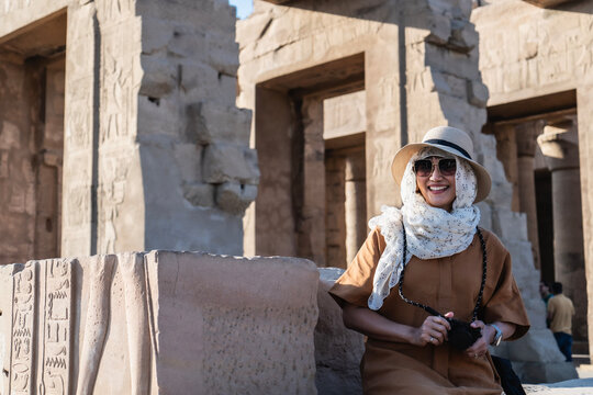 Women exploring the temple of Kom Ombo close to the river Nile / Egypt