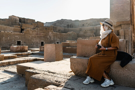 Women exploring the temple of Kom Ombo close to the river Nile / Egypt