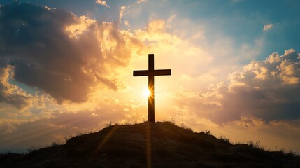 Majestic cross silhouette at sunset atop a hill religious faith hope spiritual peace