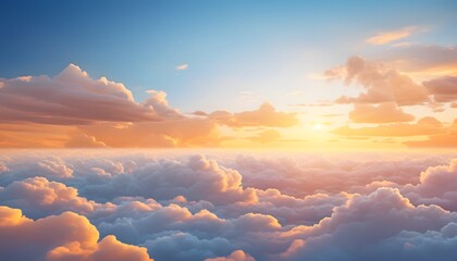 Beautiful sunset scene showing a vast sky filled with soft fluffy clouds illuminated by warm orange and pink sunlight, creating a peaceful and glowing atmosphere above the horizon