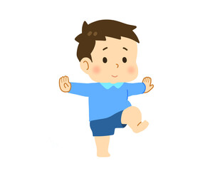 室内で片足立ちする男の子