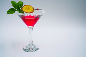Cocktail drink on the rocks with fruit isolated
