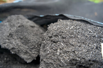 Close-up of biochar, produced through wood pyrolysis, a sustainable solution for carbon sequestration. Ideal for themes around CO2 reduction, climate change, and eco-friendly technology