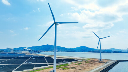 Aerial view of a hybrid wind and solar power plant