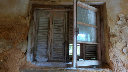Old abandoned stone house in the forest

