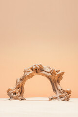 arch driftwood product display podium on the sand dune or desert.ideal mockup for product display presentation showcase backdrop design