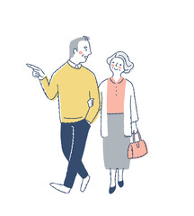 並んで歩いている笑顔のミドル・シニアカップル