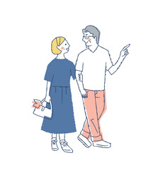 並んで歩いている笑顔のミドル・シニアカップル