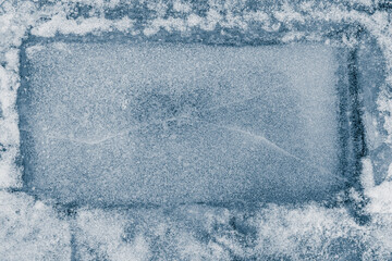 Ice texture background. Textured, light blue-toned, the cold, frosty surface of a winter river,...