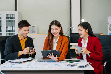 Asian business team collaboration, office project review or strategy meeting.