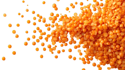 A close-up view of orange lentils spilling downward against a dynamic abstract background.