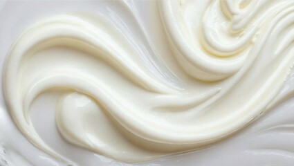 Close-up of white natural creamy vanilla yogurt. Top view. White texture of whipped cream, buttercream, and cosmetic cream. Close-up of vanilla yogurt. 
