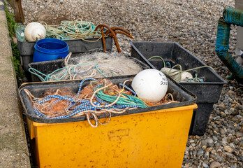 Close up of commercial fishing nets and equipment on Cromer Beach, North Norfolk Coast