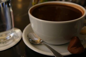 Coffee in a cup at coffee shop
