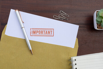 Urgent Business: Important Document and Pen on Wooden Work Surface