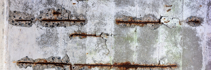 Panoramic image. Surface of an old concrete wall after long erosion