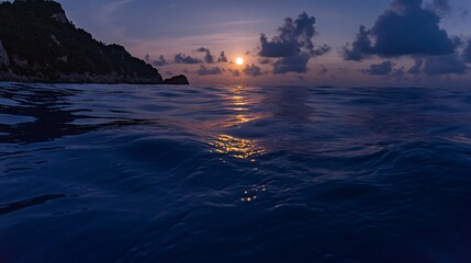 Low-angle photo of full moon rising over ocean horizon with moonlight shimmer on water created with Generative AI technology