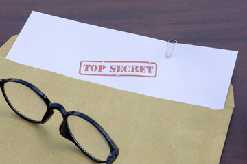 Government Intelligence Prop: Top Secret File and Envelope on Tabletop